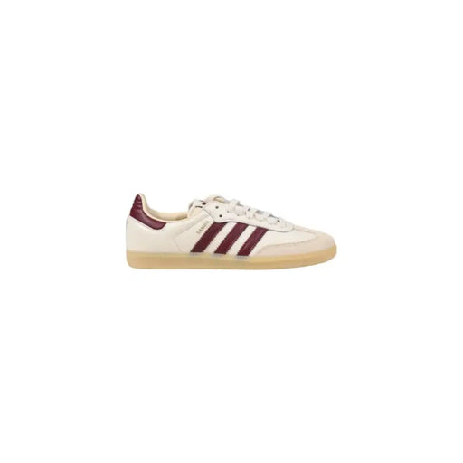 Adidas Samba white and burgundy sneaker displayed on a retail shelf