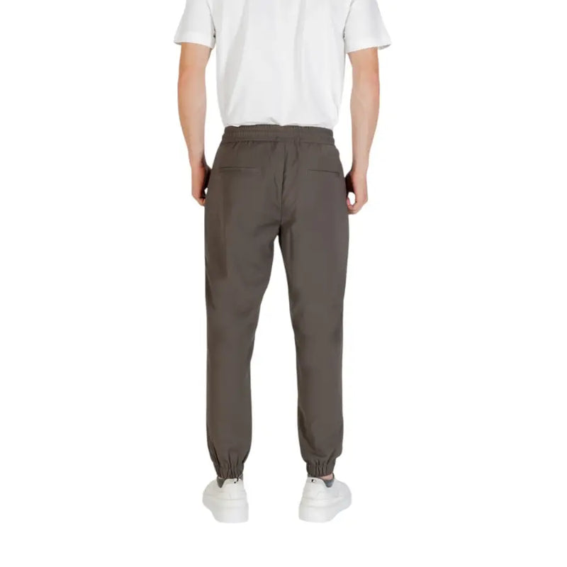 Men’s olive green jogger pants with elastic waist and cuffs, part of Antony Morato collection