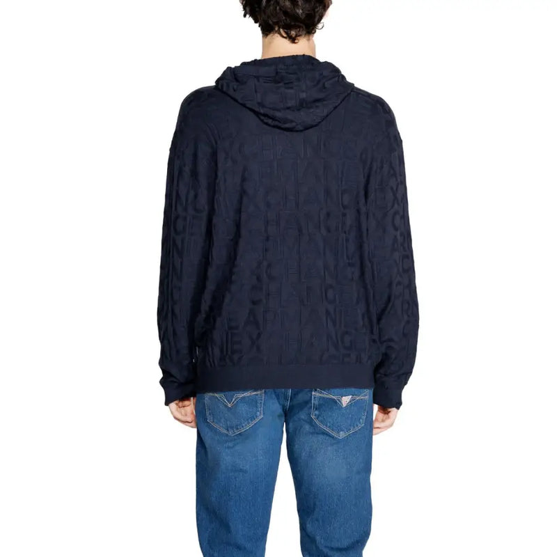 Navy blue hooded sweater with intricate lace detailing and ribbed knit texture.