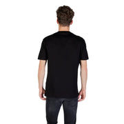 Men’s black cotton short-sleeve round neck T-shirt from Armani Exchange displayed with dark pants