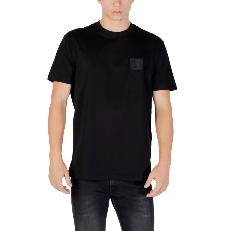 Black cotton men’s crew neck T-shirt with small square patch on left chest by Armani Exchange