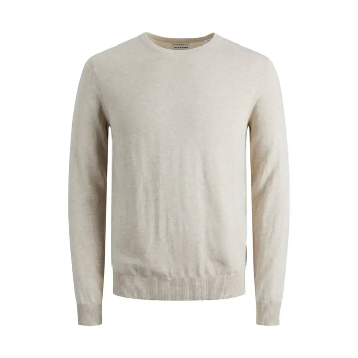 Beige crew-neck sweater displayed with dark blue jeans on a model