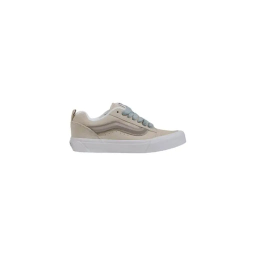Beige and gray Vans sneaker showcasing casual footwear style and design