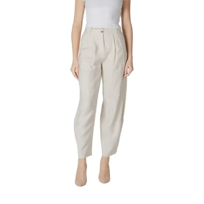 Beige pleated trousers displayed on a neutral background for elegant attire options