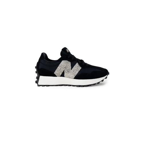 Black New Balance women sneakers with white speckled N logo, white midsole, and rubber soles