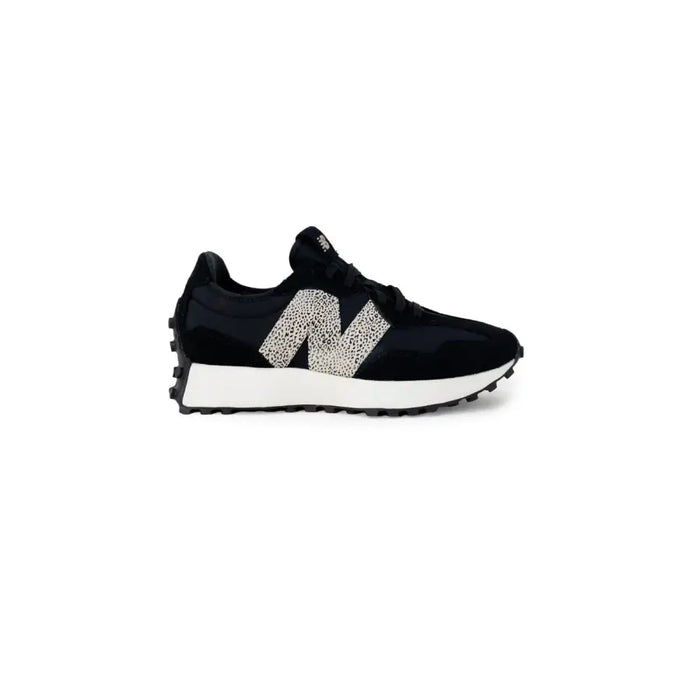 Black New Balance women sneakers with white speckled N logo, white midsole, and rubber soles