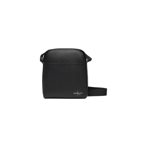 Black Calvin Klein shoulder messenger crossbody bag displayed product shot