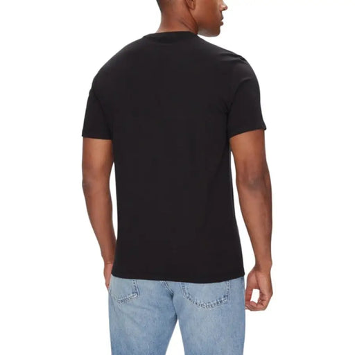 Black crew neck T-shirt from Calvin Klein Men’s collection displayed in the image