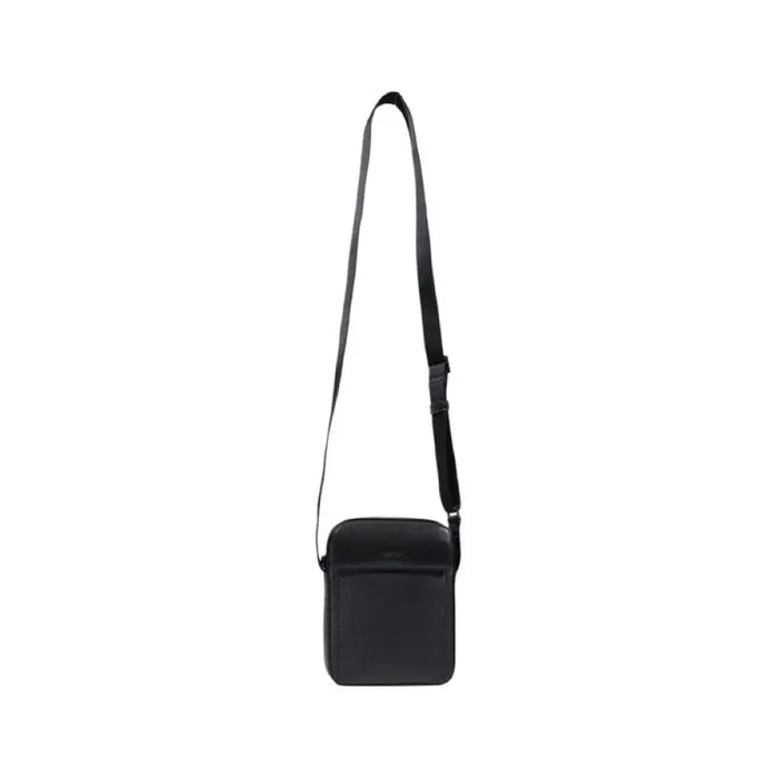 Black crossbody bag with adjustable strap for versatile and stylish everyday use