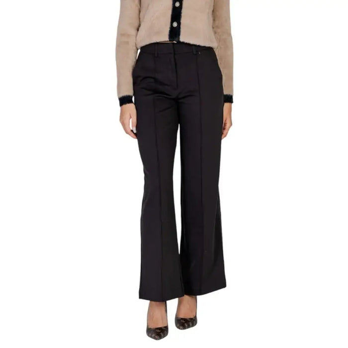 Black flared trousers showcasing a stylish and modern design for women’s fashion