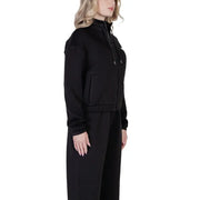 Black full-zip hoodie and sweatpants set from Guess Active Women collection