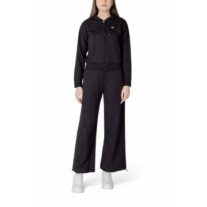 Black hooded tracksuit displayed for the product named Black Hooded Tracksuit