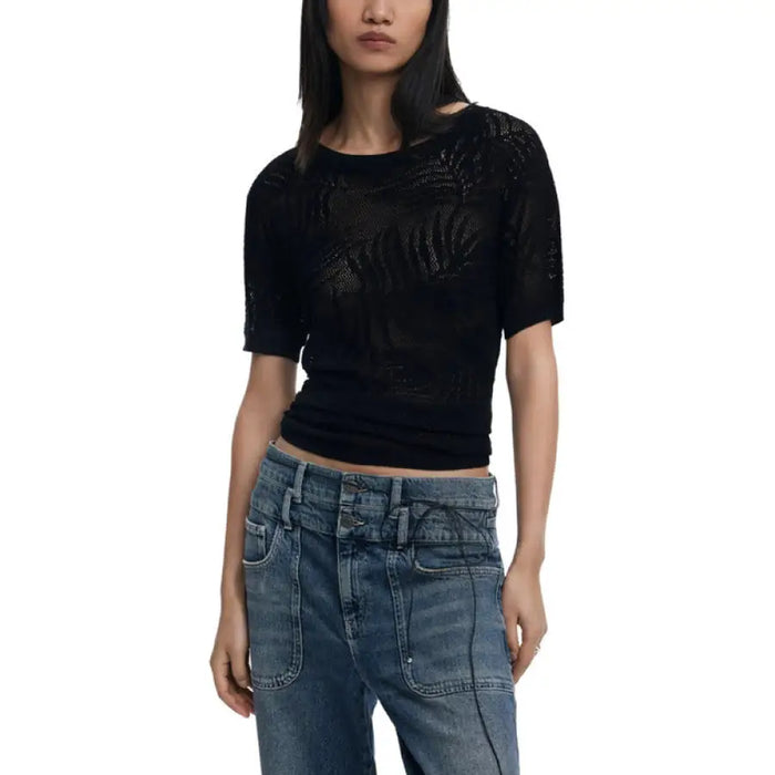 Black knit top with leaf pattern, stylish and comfortable women’s fashion piece