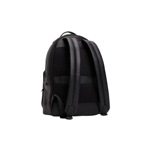Black leather Tommy Hilfiger backpack suitable for stylish travel and daily use