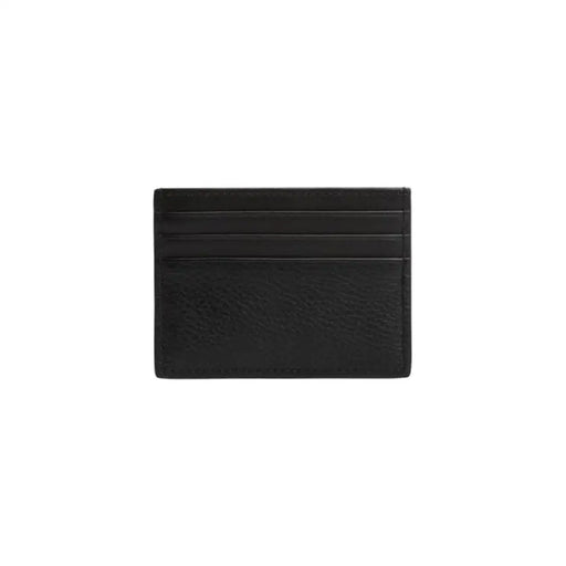 Tommy Hilfiger Black Leather Card Holder showcasing sophisticated design and craftsmanship