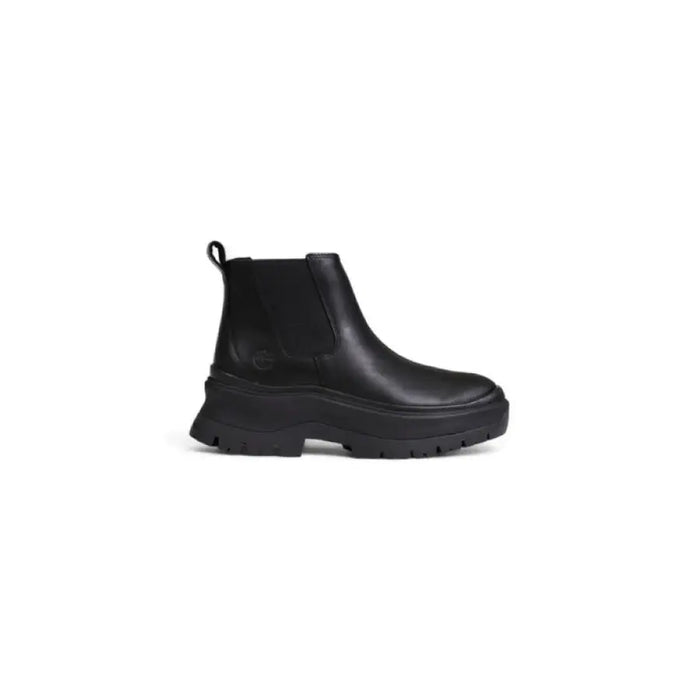 Black leather Chelsea boot with chunky sole showcasing stylish and durable footwear design