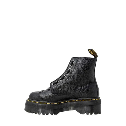 Black leather platform boots from Dr. Martens Women’s collection for stylish footwear