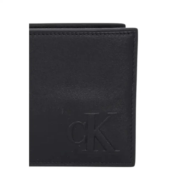 Black leather wallet featuring CK logo, stylish and premium accessory for men and women