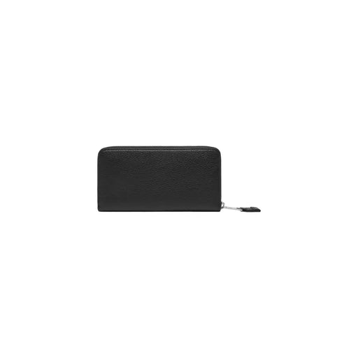 Black leather zip-around wallet from Tommy Hilfiger featuring sleek design and zipper closure