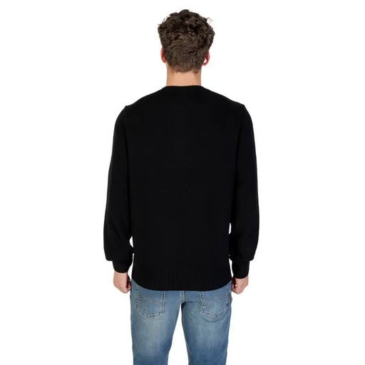 Black Lacoste long sleeve sweater displayed in a high-quality product image