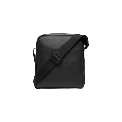 Black Calvin Klein shoulder messenger bag with adjustable strap for versatile style