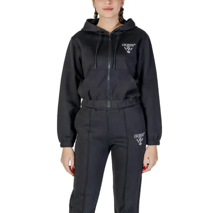 Black Prada tracksuit featuring zip-up hoodie and matching pants from Guess Active