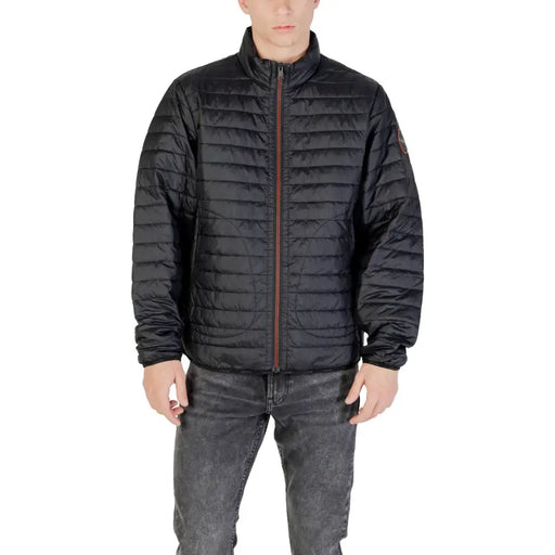 Black quilted puffer jacket displayed in the Black Quilted Puffer Jacket product image