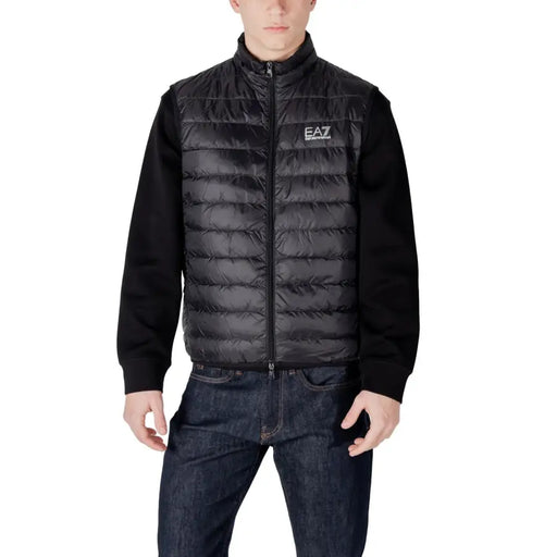 Black quilted vest with knit sleeves displayed in the Black Quilted Vest with Knit Sleeves product