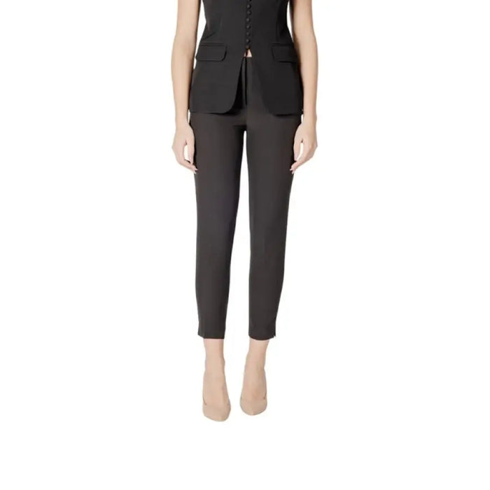 Black slim-fit trousers showcasing a modern and stylish design for versatile wear