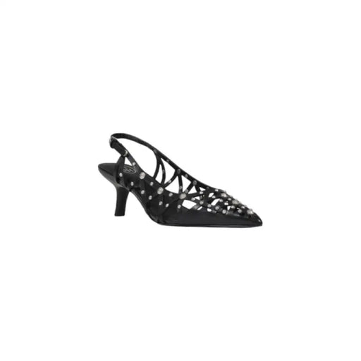 Black slingback heel with decorative cutouts, featured in the Black Slingback Heel with Decorative Embellishments product