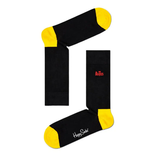 Black socks with yellow toes and heels designed for style and comfort