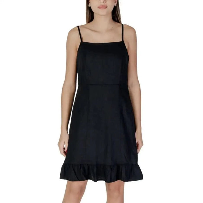 Black spaghetti strap dress featured in B.young Women’s Brown Slip-On Dress with Straps