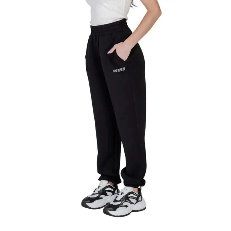 Black GUESS Active Women sweatpants with elastic cuffs and side pockets featuring logo