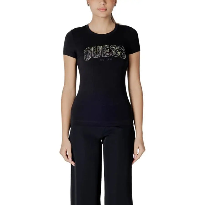 Black T shirt featuring Guess logo displayed on a product with the same name
