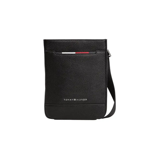 Black Tommy Hilfiger leather crossbody bag displayed with wallet in product image