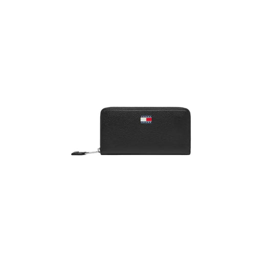 Black Tommy Hilfiger leather zipper wallet displayed in the product line