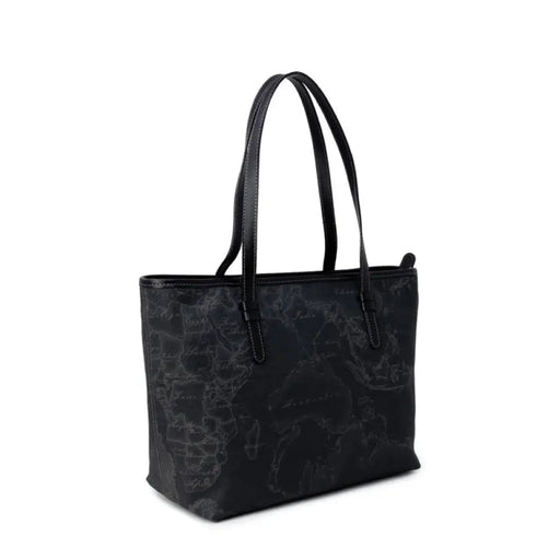 Black tote bag featuring a detailed world map pattern ideal for travel lovers