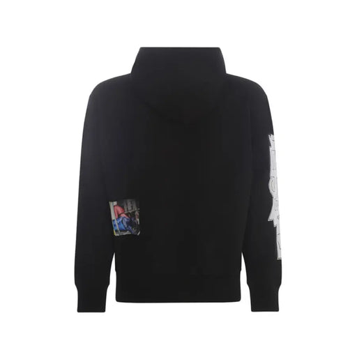Black hooded sweatshirt with graphic patches, stylish and modern men’s casual wear