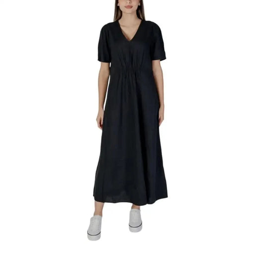 Black V-neck maxi dress featured in B.young Black V-Neck Short Dress product display