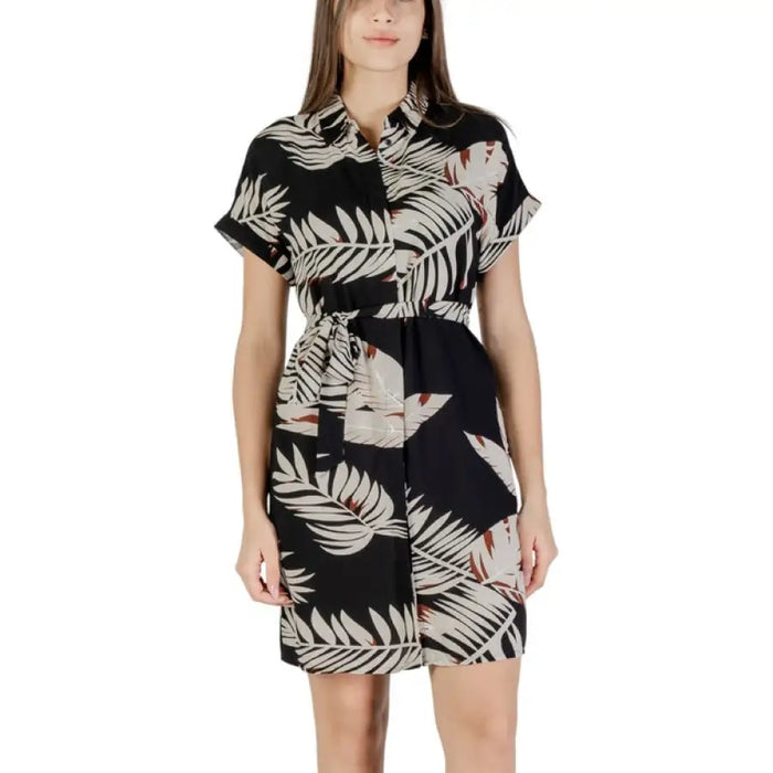 Black and white leaf-patterned shirt dress displayed in Women’s Leaf Patterned Romper and Shirt Dress product image