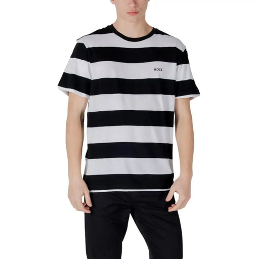 Black and white striped T shirt displayed in a product image for fashion apparel