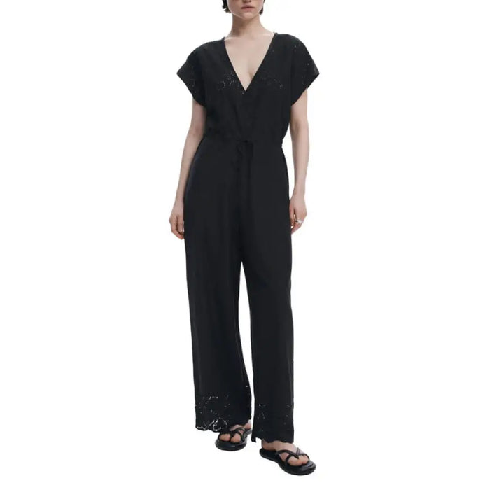 Black V Neck Embellished Wrap Jumpsuit displayed on a model showcasing elegant evening attire