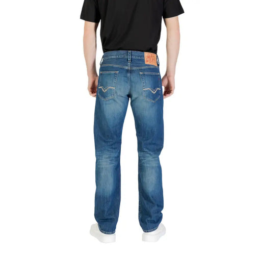 Blue denim jeans displayed in a product listing offering stylish and durable apparel