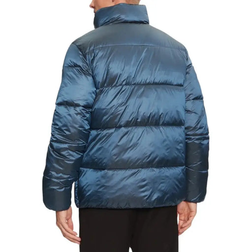 Blue puffer jacket designed for warmth and style in cold weather