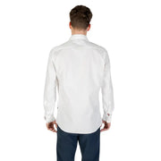 Men’s classic white cotton long-sleeved dress shirt with dark trousers for formal wear