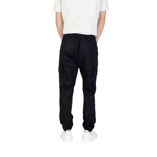 Men’s black cargo pants with side pockets from Calvin Klein Jeans for fall winter season