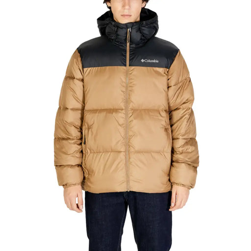 Tan and black columbia puffer jacket with hood.