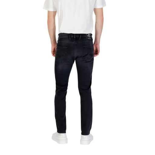 Dark wash slim-fit jeans displayed in the product image for stylish men’s fashion