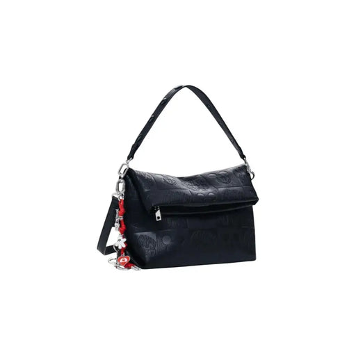 Embossed black polyurethane shoulder bag with decorative keychain for women, Fall Winter collection