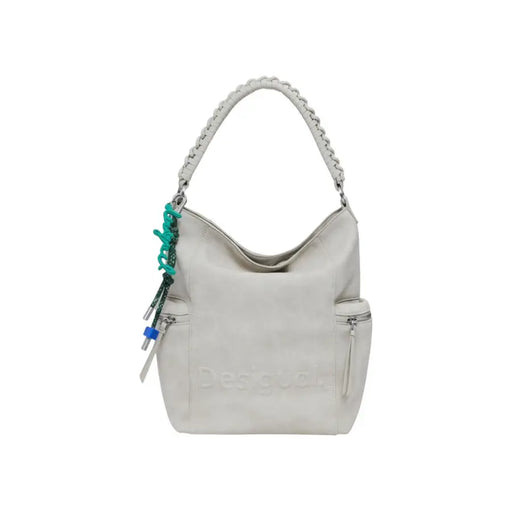 Light gray slouchy shoulder bag with braided strap and decorative charms for women